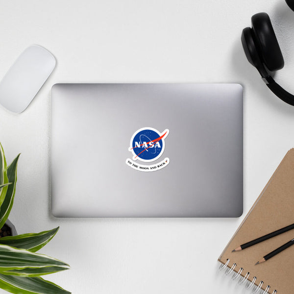 Lifestyle shot of a NASA To the Moon and Back Sticker