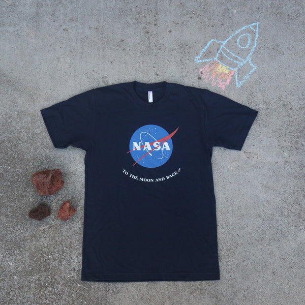 Navy NASA T-shirt with To the Moon and Back on it with a chalked rocket and red rocks next to it