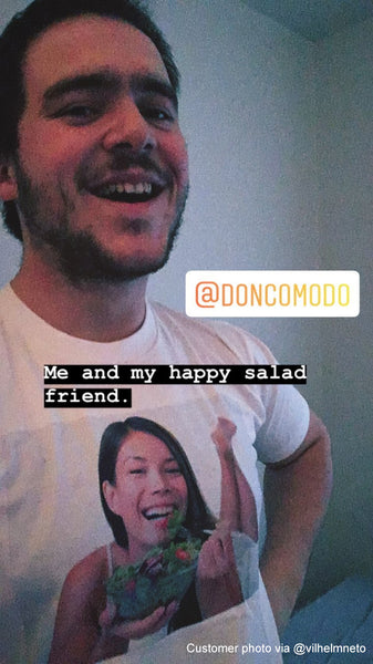 A customer (actor and Vine star Vilhelm Neto) wearing the Smiling woman eating a healthy vegetable salad T-shirt